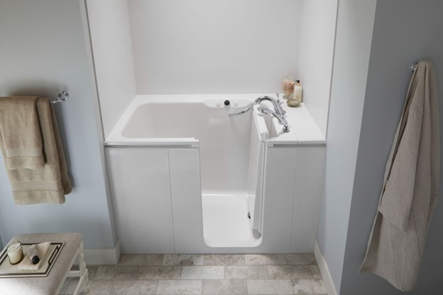 Photo of a ZINTEX walk in tub from the exterior side with the door open