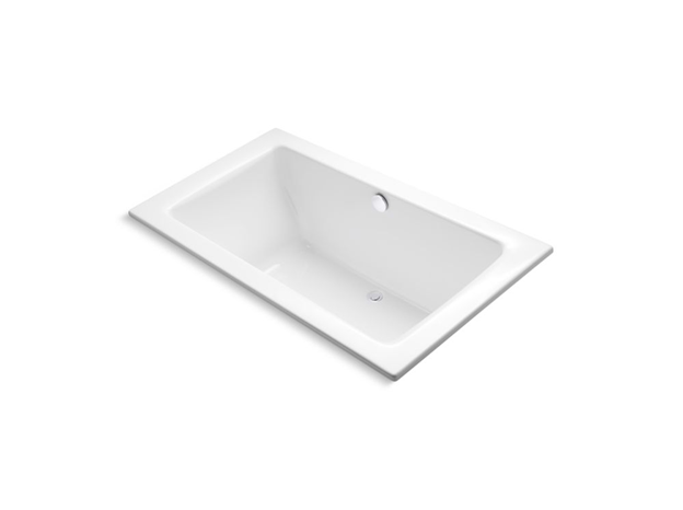 A white bathtub with a silver buttonAI-generated content may be incorrect.